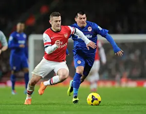 Arsenal V Cardiff City 2013-14 Prints: Jack Wilshere vs Gary Medel: Midfield Battle in Arsenal vs Cardiff City, Premier League
