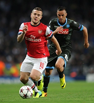 Arsenal V Napoli 2013-14 Prints: Jack Wilshere vs. Giandomenico Mesto: Arsenal vs. Napoli, UEFA Champions League, 2013