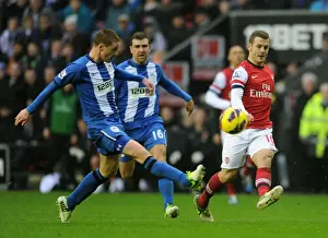 Wigan Athletic V Arsenal 2012-13 Prints: Jack Wilshere vs. James McCarthy: Intense Battle in Wigan Athletic vs