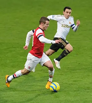 Arsenal V Swansea - FA Cup 3rd Rd Replay 2012-13 Prints: Jack Wilshere vs. Leon Britton: Battle at the Emirates - Arsenal v Swansea FA Cup Replay