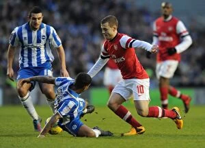 Images Dated 26th January 2013: Jack Wilshere vs. Liam Bridcutt: A FA Cup Battle at the Amex Stadium
