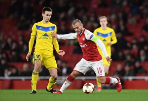 Arsenal V BATE Borisov 2017-18 Prints: Jack Wilshere vs. Mirko Ivanic: Arsenal FC vs. BATE Borisov, UEFA Europa League Showdown