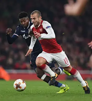 Arsenal V Red Star Belgrade 2017-18 Prints: Jack Wilshere vs. Mitchell Donald: A Europa League Showdown at Arsenal's Emirates Stadium