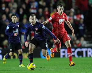 Images Dated 1st January 2013: Jack Wilshere vs Morgan Schneiderlin: Intense Battle in Southampton v Arsenal (2012-13)