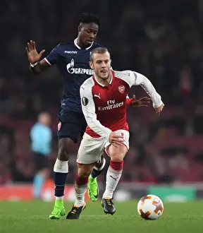 Arsenal V Red Star Belgrade 2017-18 Prints: Jack Wilshere vs. Richmond Donald: Arsenal's Midfield Battle in Europa League Clash