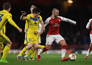 Arsenal V BATE Borisov 2017-18 Prints: Jack Wilshere vs. Stanislav Dragun: A Europa League Showdown