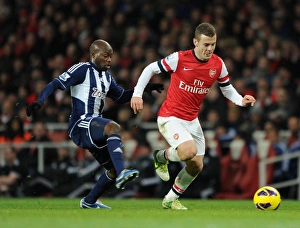 Arsenal V West Bromwich Albion 2012-13 Prints: Jack Wilshere vs Youssouf Mulumbu: Intense Battle at Emirates Stadium (Arsenal v West Bromwich Albion 2012-13)