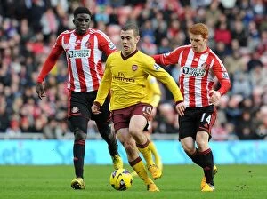Images Dated 9th February 2013: Jack Wilshere's Agile Moves: Outmaneuvering Colback and N'Diaye (Sunderland vs Arsenal, 2013)