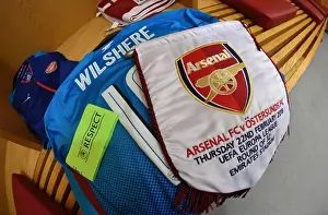 Arsenal V Östersunds FK 2017-18 Prints: Jack Wilshere's Arsenal Shirt and Match Pennant on Display - Arsenal vs Östersunds FK (2017-18)