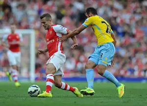 Arsenal V Crystal Palace 2014/15 Prints: Jack Wilshere's Dazzling Skill: Outmaneuvering Joe Ledley for Arsenal vs Crystal Palace in the Premier League
