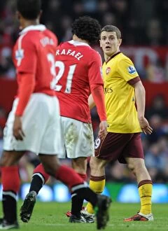 Manchester United v Arsenal FA Cup 2010-11 Collection: Jack Wilshere's Determined Performance in Manchester United's 2-0 FA Cup Victory over Arsenal
