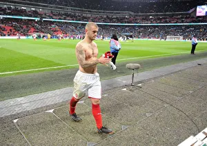 Arsenal V Manchester City - Carabao Cup Final 2018 Prints: Jack Wilshere's Heartfelt Gesture: Throwing His Shirt to a Fan Amidst Manchester City's Carabao Cup Victory