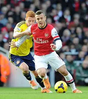 Arsenal V Sunderland 2013-14 Prints: Jack Wilshere's Magic: Outmaneuvering Jack Colback in Arsenal's Premier League Victory (2013-14)