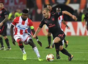 Red Star Belgrade V Arsenal 2017-18 Prints: Jack Wilshere's Powerful Past: Overpowering Mitchell Donald in Arsenal's Europa League Triumph