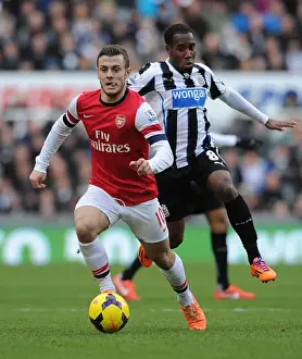 Newcastle United V Arsenal 2013-14 Prints: Jack Wilshere's Slick Moves: Outsmarting Moussa Sissoko in Premier League Clash