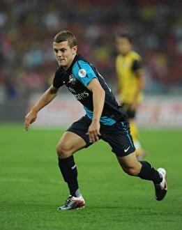 Images Dated 13th July 2011: Jack Wilshere's Stellar Performance: Arsenal Thrashes Malaysia XI 4-0