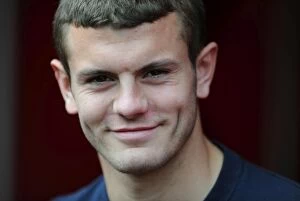 Arsenal v Liverpool 2011-2012 Collection: Jack Wilshere's Struggle: Arsenal's Defeat to Liverpool (2011)