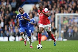 Chelsea v Arsenal 2010-11 Collection: Jay Emmanuel Thomas (Arsenal) Didier Drogba (Chelsea). Chelsea 2: 0 Arsenal