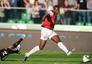 Images Dated 7th August 2010: Jay Emmanuel Thomas breaks past Srda Knezevic to score the 5th Arsenal goal