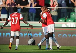 Images Dated 7th August 2010: Jay Emmanuel Thomas celebrates scoring the 5th Arsenal goal with Kieran Gibbs