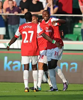 Legia Warsaw V Arsenal 2010-11 Prints: Jay Emmanuel Thomas celebrates scoring the 5th Arsenal goal with Kieran Gibbs