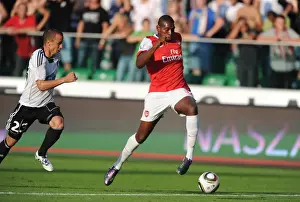 Legia Warsaw V Arsenal 2010-11 Prints: Jay Emmanuel Thomas Scores the Fifth Goal Past Srda Knezevic in Arsenal's Thrilling 5:6 Victory over Legia Warsaw