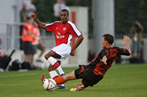 Burgenland XI v Arsenal Gallery: Jay Simpson (Arsenal) Christoph Kiss (Burgenland)