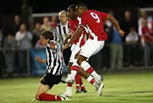 Images Dated 28th July 2009: Jay Simpson scores Arsenals 3rd goal under pressure from Jack Bradshaw (Maidenhead)