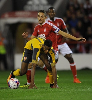 Images Dated 20th September 2016: Jeff Reine-Adelaide (Arsenal) Chris Cohen (Forest). Nottingham Forest 0: 4 Arsenal