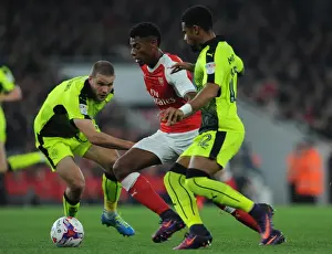 Jeff Reine-Adelaide (Arsenal) Joey van den Berg and Tennai Watson (Reading). Arsenal 2