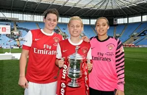 Jennifer Beattie, Gilly Flaherty and Rebecca Spencer (Arsenal) with the FA Cup Trophy