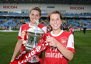 Arsenal Ladies V Bristol Academy FA Cup Final 2011 Prints: Jennifer Beattie and Niamh Fahey (Arsenal) with the FA Cup Trophy. Arsenal Ladies 2