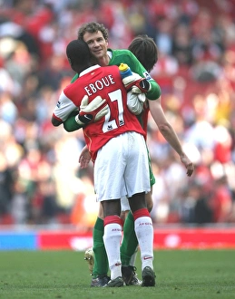 Lehmann Jens Collection: Jens Lehmann and Emmanuel Eboue celebrate after the match