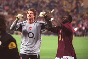 Jens Lehmann and Kolo Toure (Arsenal) celebrate their draw that puts them into the final