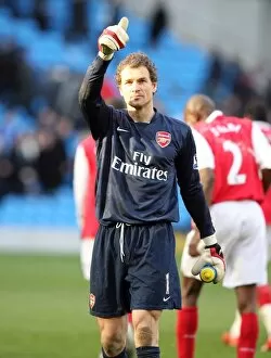 Jens Lehmann salutes the Arsenal fans after the match