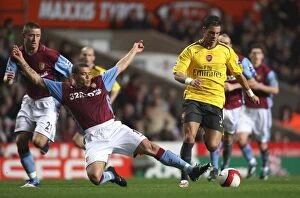 Images Dated 15th March 2007: Jeremie Aliadiere (Arsenal) Wilfred Bouma (Aston Villa)