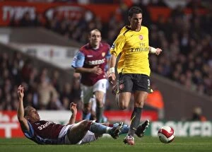 Images Dated 15th March 2007: Jeremie Aliadiere (Arsenal) Wilfred Bouma (Aston Villa)