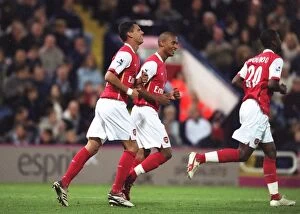 Jeremie Aliadiere celebrates scoring his and Arsenals 2nd goal with Armand Traore