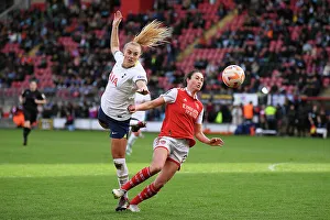 Tottenham Hotspur Women V Arsenal Women 2022-23 Prints: Jodie Taylor vs Molly Bartrip: Battle for Possession in Tottenham Hotspur vs Arsenal Women's Super League Clash