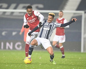 Images Dated 2nd January 2021: Joe Willock Clashes with Callum Robinson: West Bromwich Albion vs. Arsenal, Premier League 2020-21