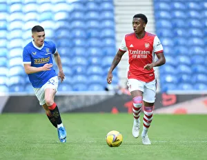 Glasgow Rangers V Arsenal 2021-22 Prints: Joe Willock Clashes with Jake Hastie: Rangers vs