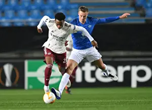 Molde FK V Arsenal 2020-21 Prints: Joe Willock Clashes with Stian Gregersen: Molde FK vs Arsenal FC