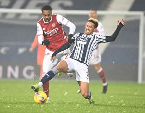 Images Dated 2nd January 2021: Joe Willock vs Callum Robinson: Clash at The Hawthorns - West Bromwich Albion vs Arsenal