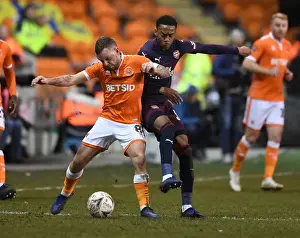 Blackpool V Arsenal - FA Cup 2019 Prints: Joe Willock vs. Jay Spearing: Intense Face-Off in FA Cup Clash between Arsenal and Blackpool