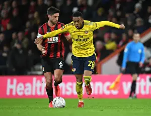 AFC Bournemouth V Arsenal - FA Cup 4th Rd 2020 Prints: Joe Willock vs. Lewis Cook: Intense FA Cup Showdown between Arsenal and Bournemouth