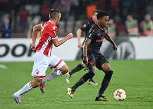 Joe Willock vs. Nenad Krsticic: A Europa League Battle at Rajko Mitic Stadium