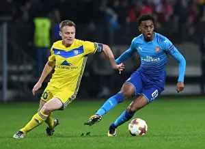 FC BATE Borisov V Arsenal 2017-18 Prints: Joe Willock vs Vitali Rodionov: A Europa League Battle at Borisov-Arena