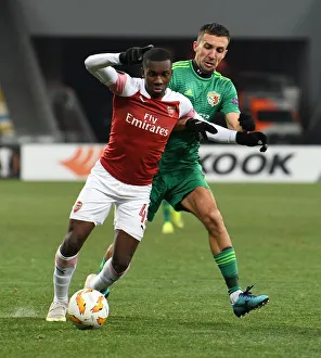 FC Vorskla Poltava V Arsenal 2018-19 Prints: Joe Willock vs. Vyacheslav Sharpar