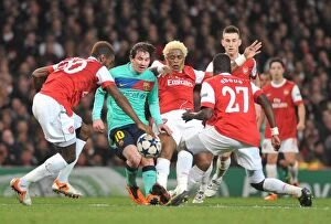 Images Dated 16th February 2011: Johan Djourou, Alex Song and Emmanuel Eboue (Arsenal) Lionel Messi (Barcelona)