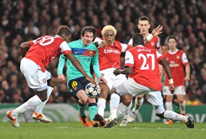 Images Dated 16th February 2011: Johan Djourou, Alex Song and Emmanuel Eboue (Arsenal) Lionel Messi (Barcelona)